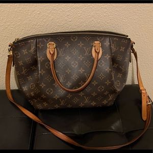 Louis Vuitton handbag. Includes box,purchase receipt, and proof of authenticity